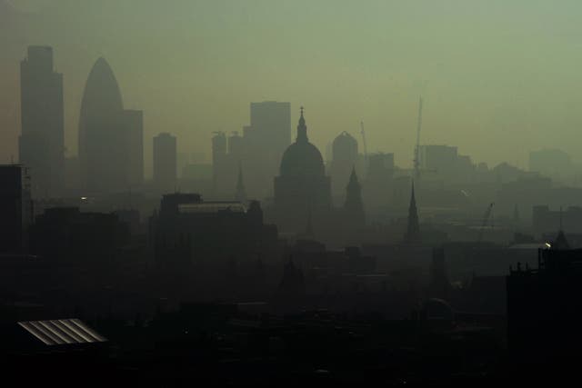 <p>St. Paul’s Cathedral is seen among the skyline through the smog in 2011.</p>
