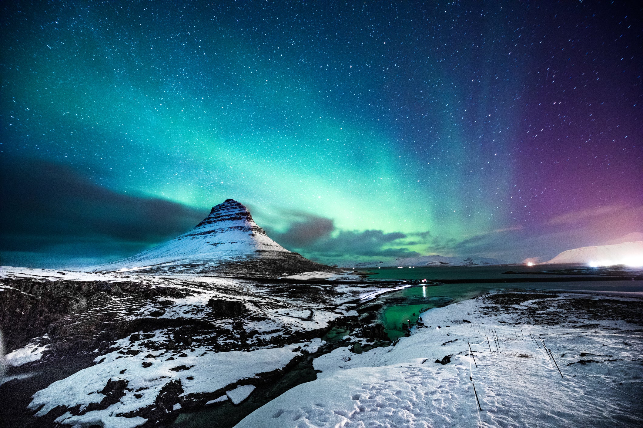 The Northern Lights in Mount Kirkjufell, in the west of Iceland