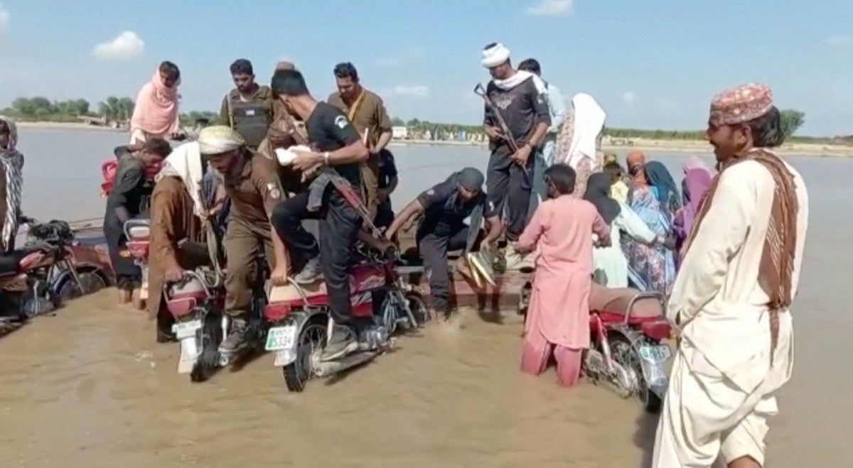 18 women drown and dozens missing after boat carrying 100 people capsizes in Pakistan