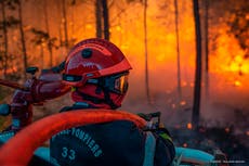 Man detained in police probe of raging wildfires in France