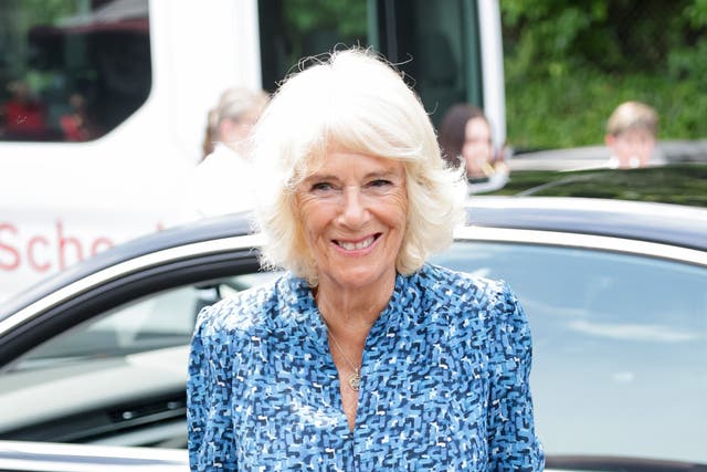 The Duchess of Cornwall apologised for apparently bringing a summer deluge to Launceston as the heatwave broke in Cornwall (Chris Jackson/PA)