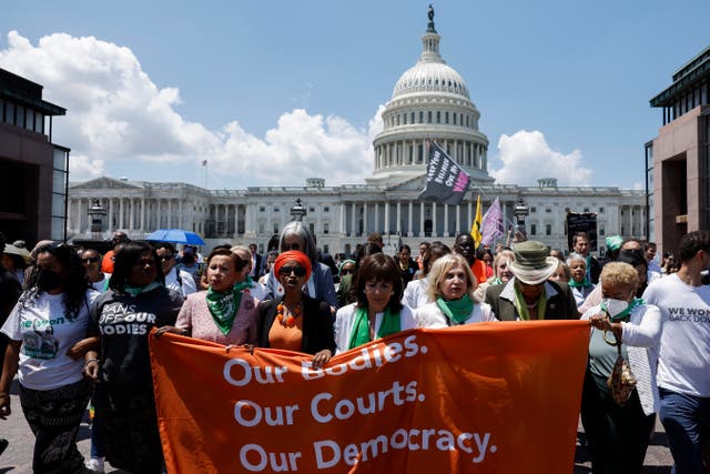 <p>Protesters at an abortion rights demonstration outside the Supreme Court</p>