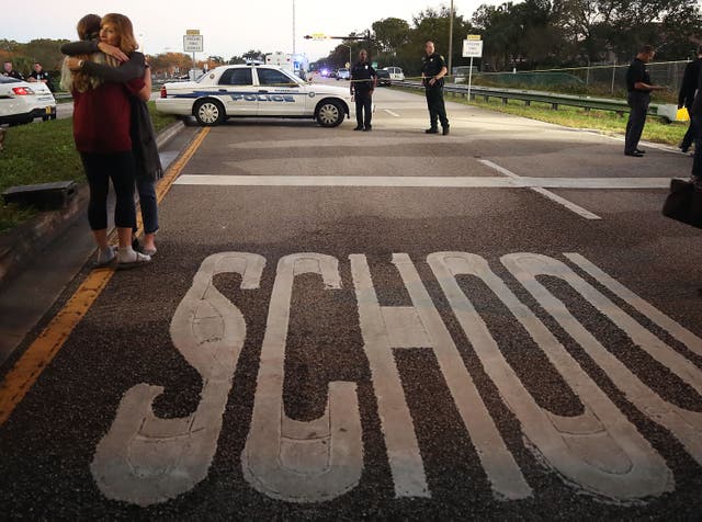 <p>The scene of the Parkland shooting in 2018: campus police have been present for – but unable to stop – a number of school shootings
</p>