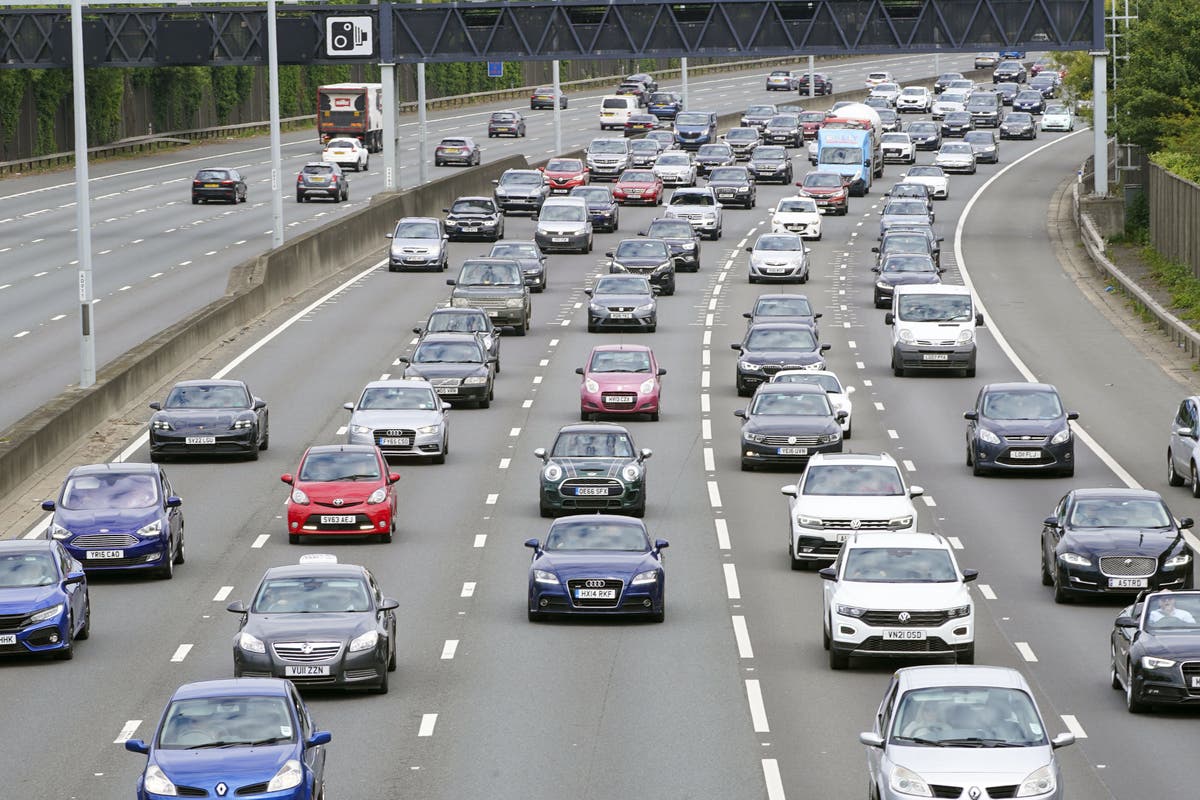 Just Stop Oil demonstrators climb motorway signs in climate protest
