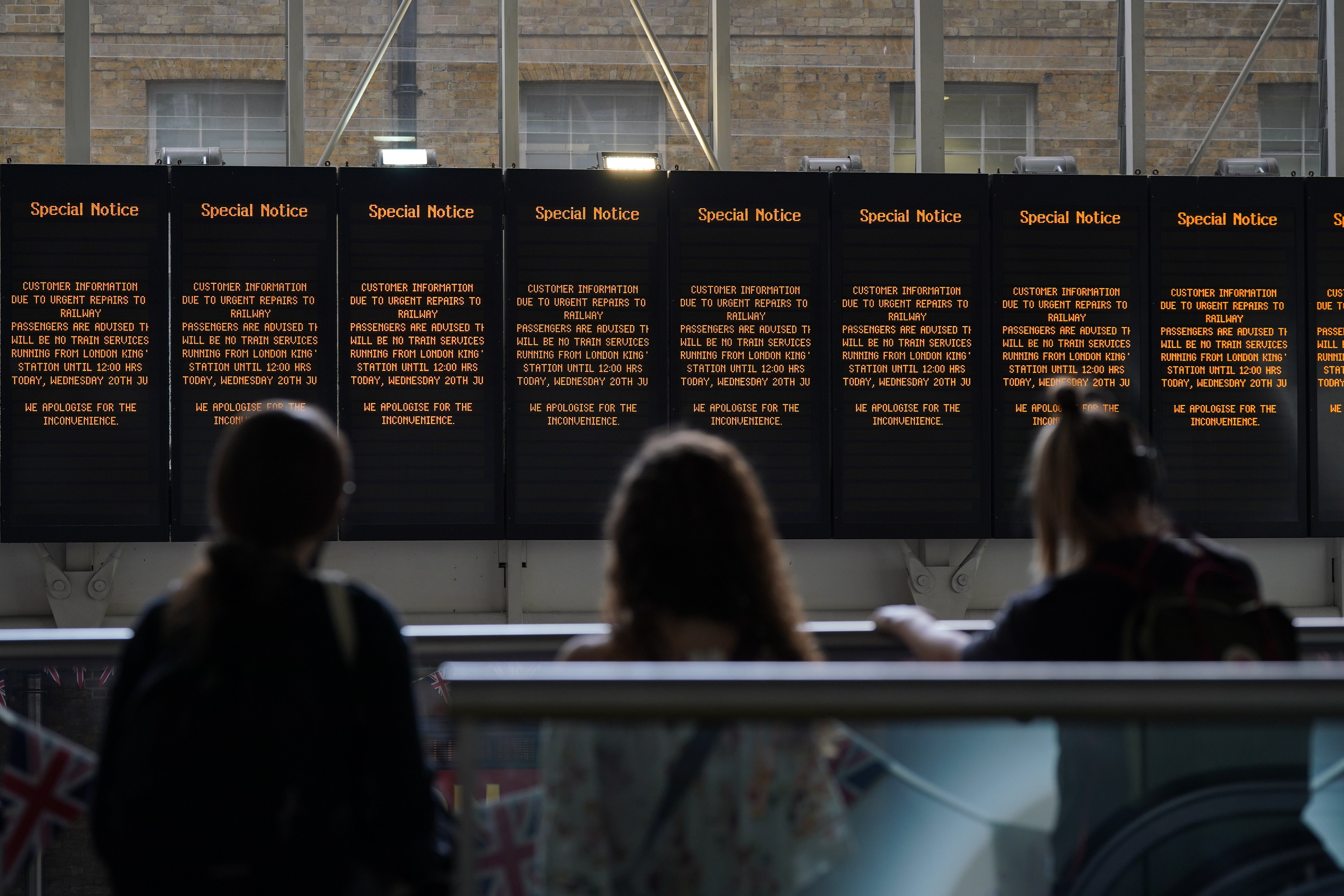 Passengers at King’s Cross station in London following train cancellations (Yui Mok/PA)