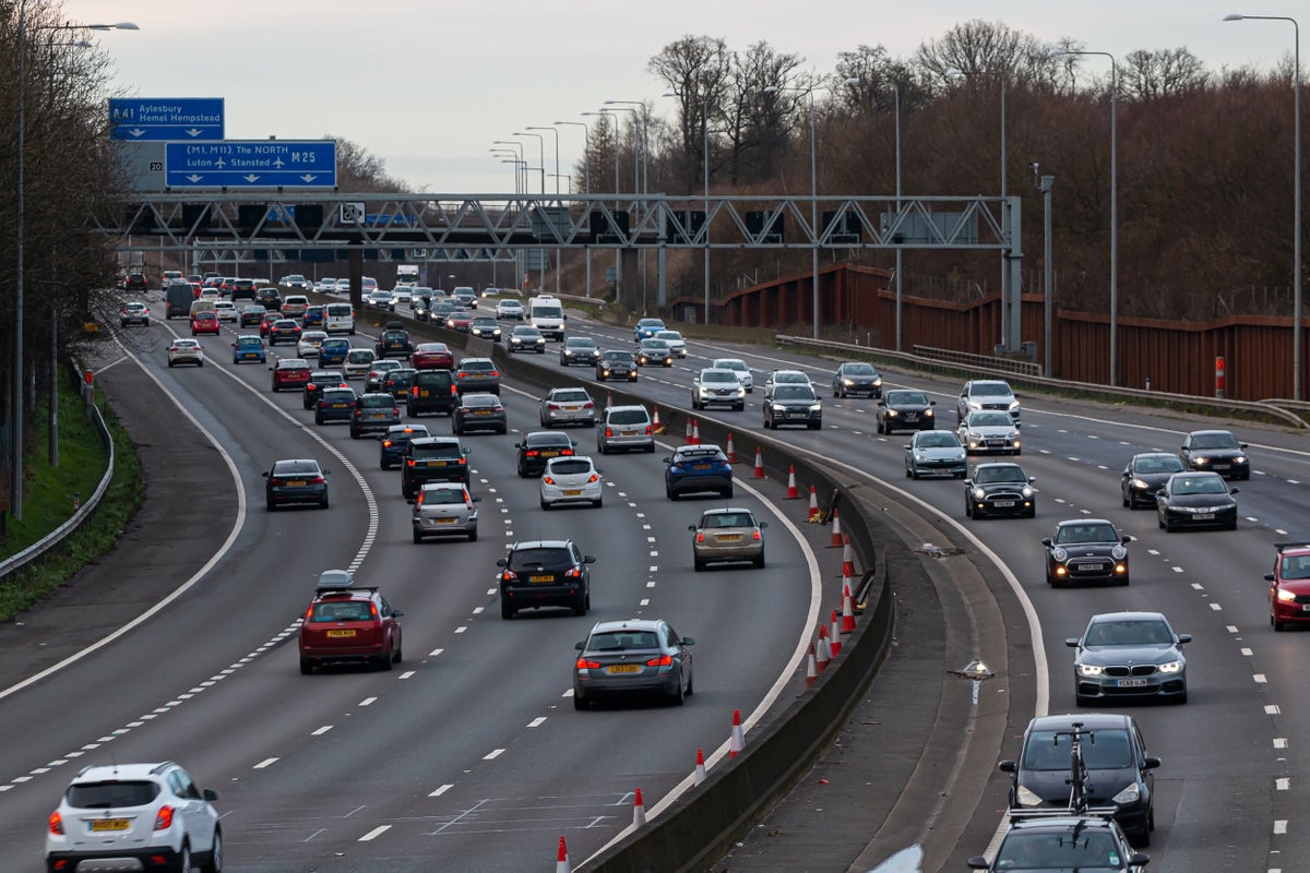 M3 crash: Two dead and motorway closed after car hits central reservation