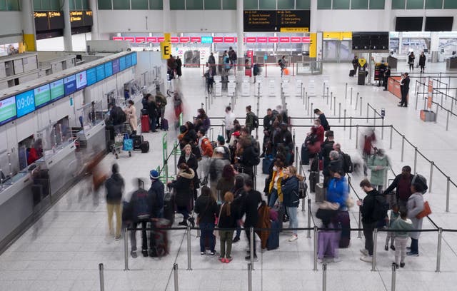 Gatwick Airport has taken on 400 new security staff in recent weeks to help ease queues (Gareth Fuller/PA)