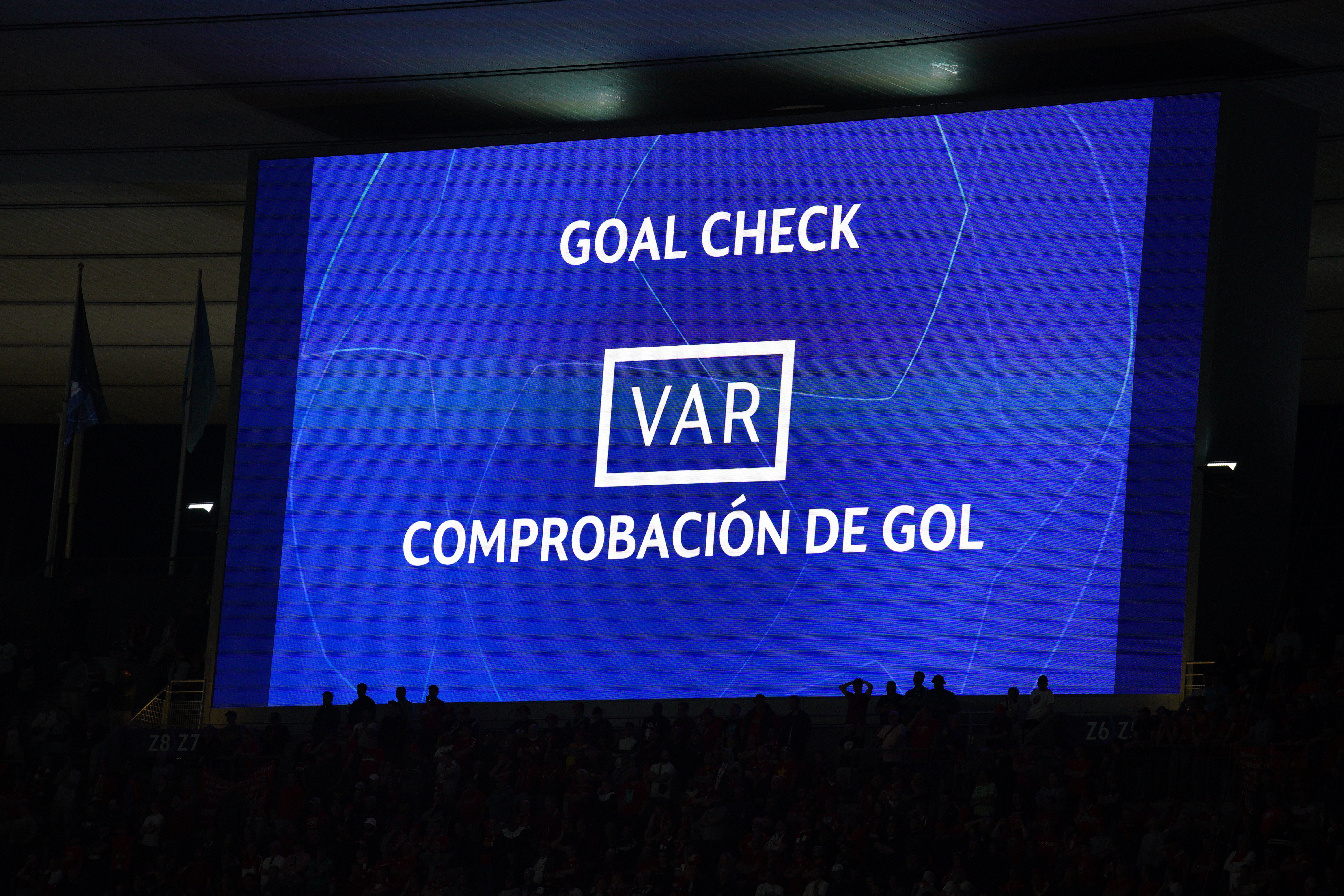 The giant screen displays a VAR Check during the UEFA Champions League Final at the Stade de France, Paris (Peter Byrne/PA)