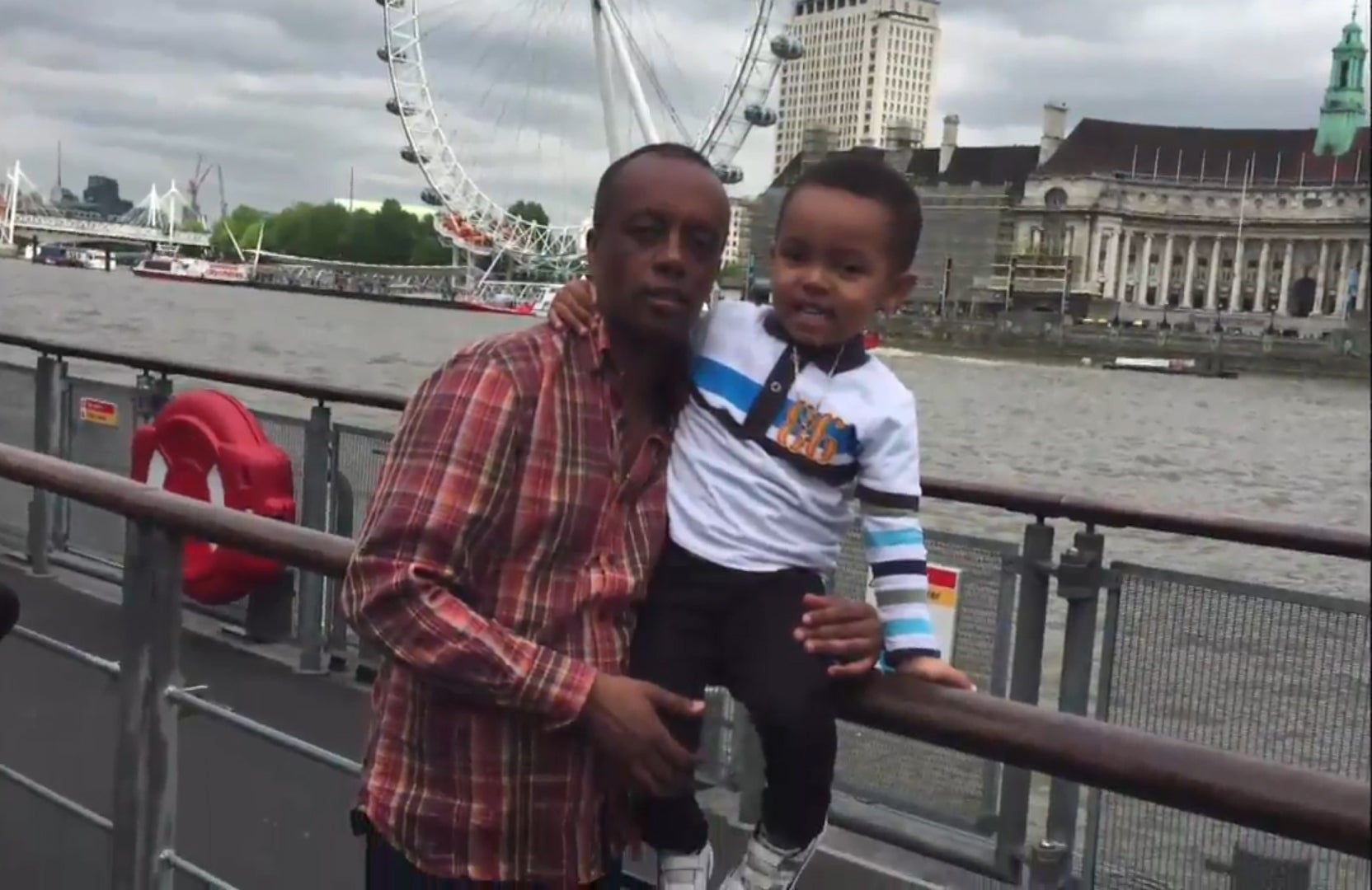 Paulos Tekle with his son Isaac Paulos who died of smoke inhalation