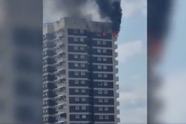 <p>London Fire Brigade said its crews were tacking the blaze on Manwood Street in North Greenwich </p>