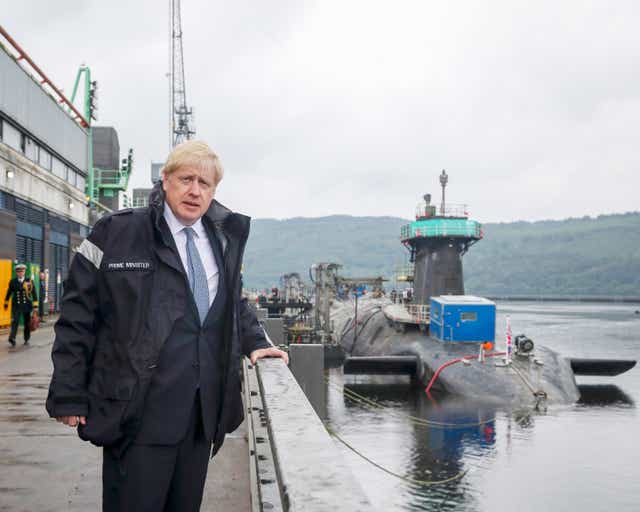 Boris Johnson wearing a jacket with the words Prime Minister as he visits HMS Victorious at HM Naval Base Clyde in Faslane, Scotland (Ben Shread/MoD, Crown Copyright/PA)