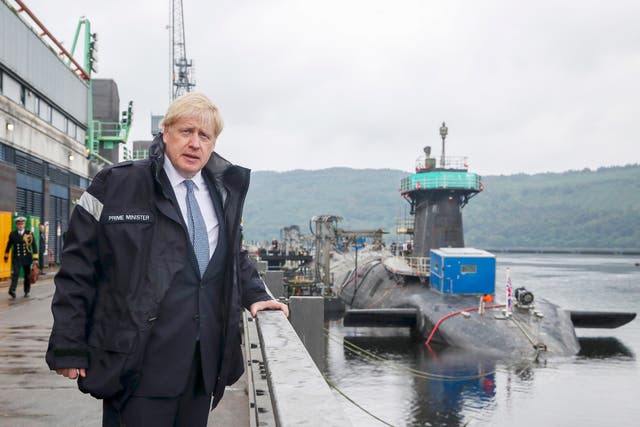 Boris Johnson wearing a jacket with the words Prime Minister as he visits HMS Victorious at HM Naval Base Clyde in Faslane, Scotland (Ben Shread/MoD, Crown Copyright/PA)
