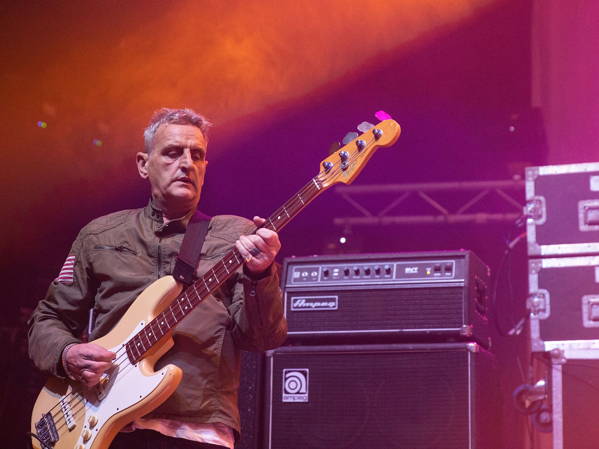 Paul Ryder onstage with Happy Mondays in 2019