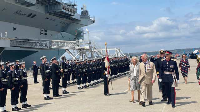 The Prince of Wales and the Duchess of Cornwall visited HMS Queen Elizabeth in Portsmouth (Ben Mitchell/PA)