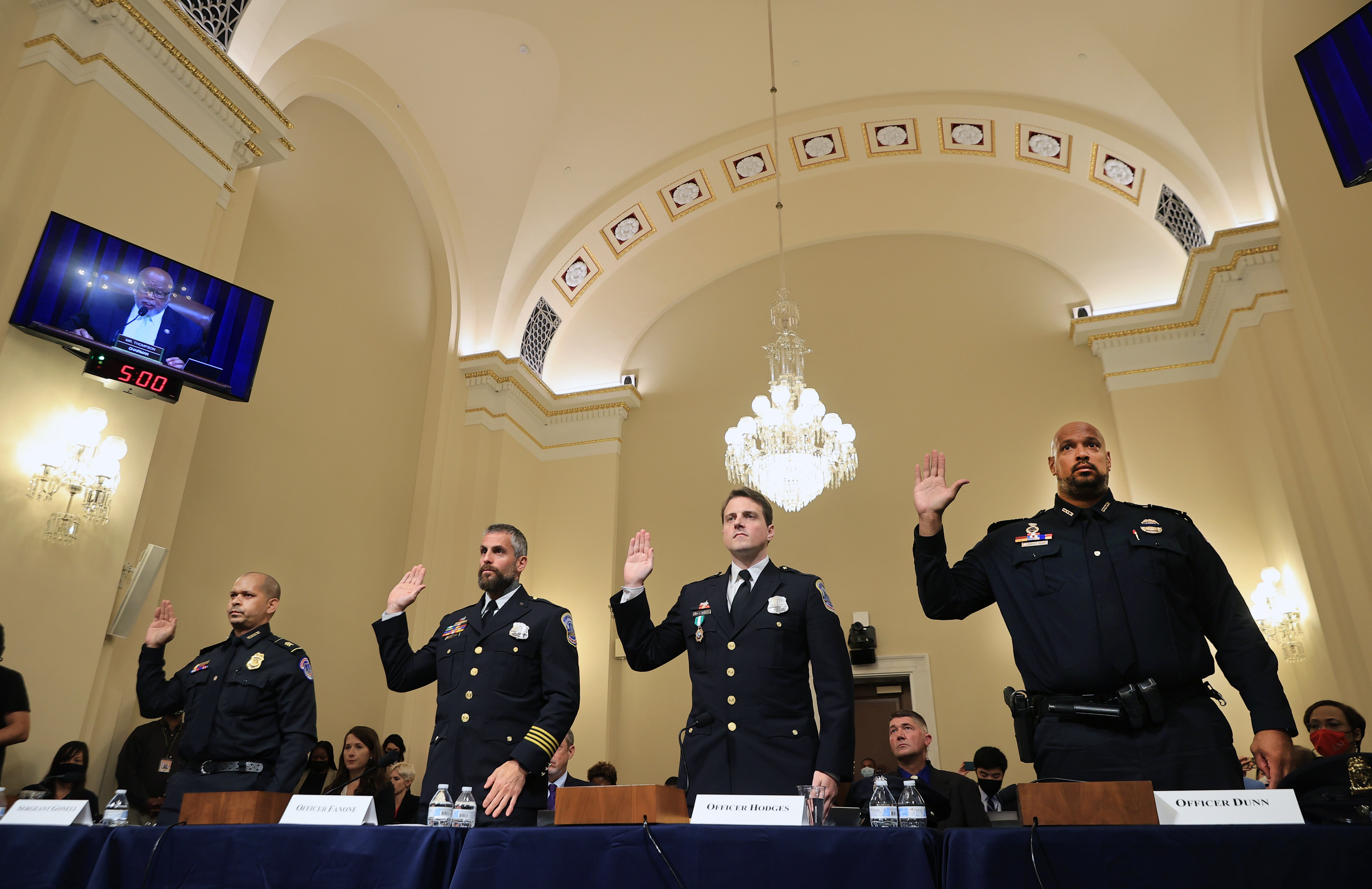 U.S. Capitol Police officer Sgt. Aquilino Gonell, DC Metropolitan Police Department officer Michael Fanone, DC Metropolitan Police Department officer Daniel Hodges and U.S. Capitol Police officer Harry Dunn are sworn in
