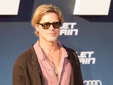 Brad Pitt reveals surprising reason he wore a skirt on Bullet Train red carpet