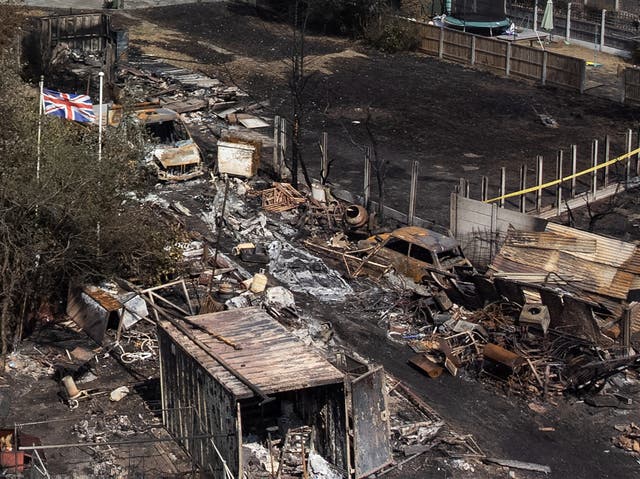 <p>Residents speak of the moment a fire ripped through their homes in an east London village on the hottest day of the year</p>