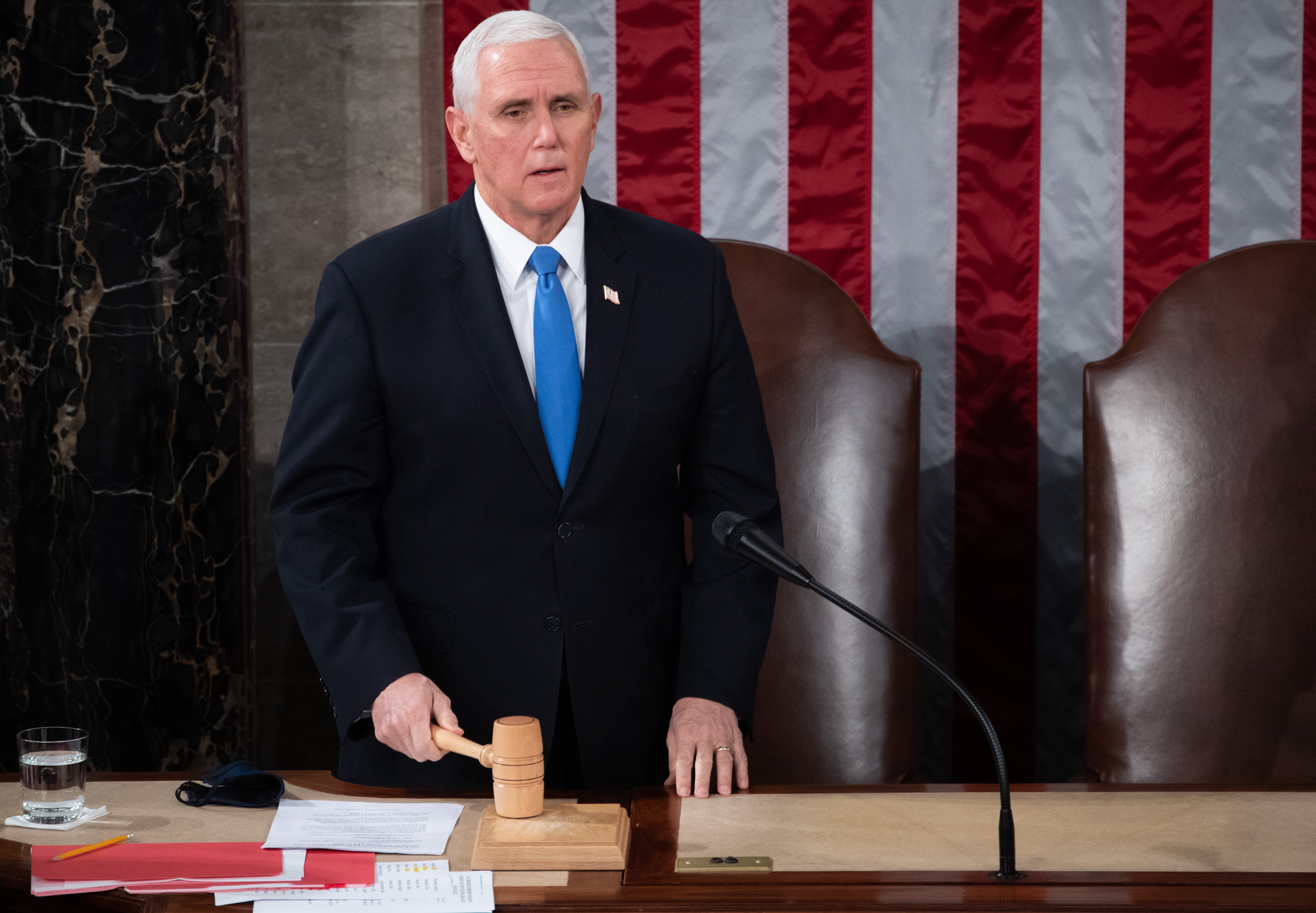 US Vice President Mike Pence presides over a joint session of Congress to count the electoral votes for President at the US Capitol in Washington, DC, January 6, 2021.