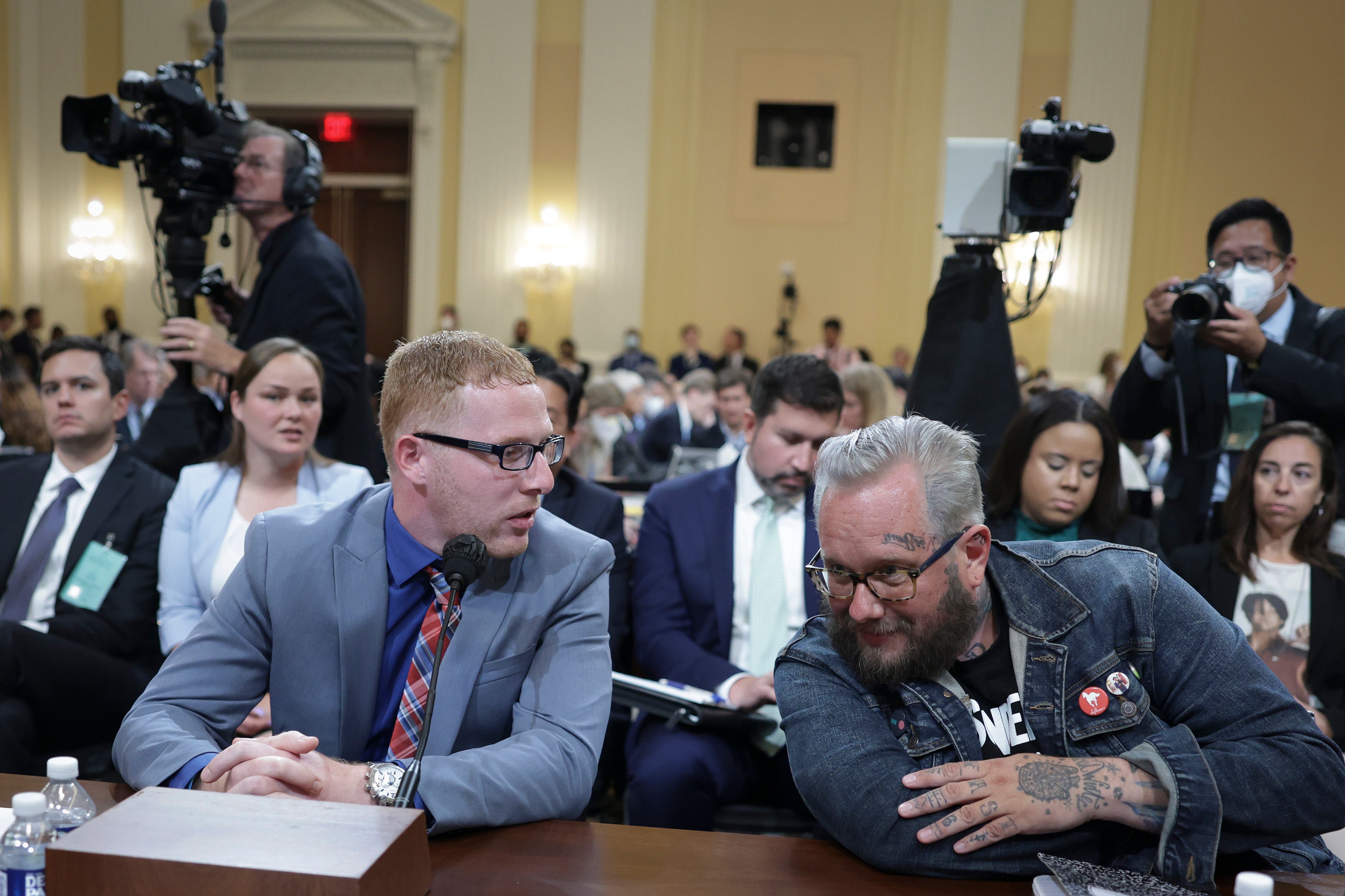 Stephen Ayres (L), who entered the U.S. Capitol illegally on January 6, 2021, confers with Jason Van Tatenhove (R), who served as national spokesman for the Oath Keepers