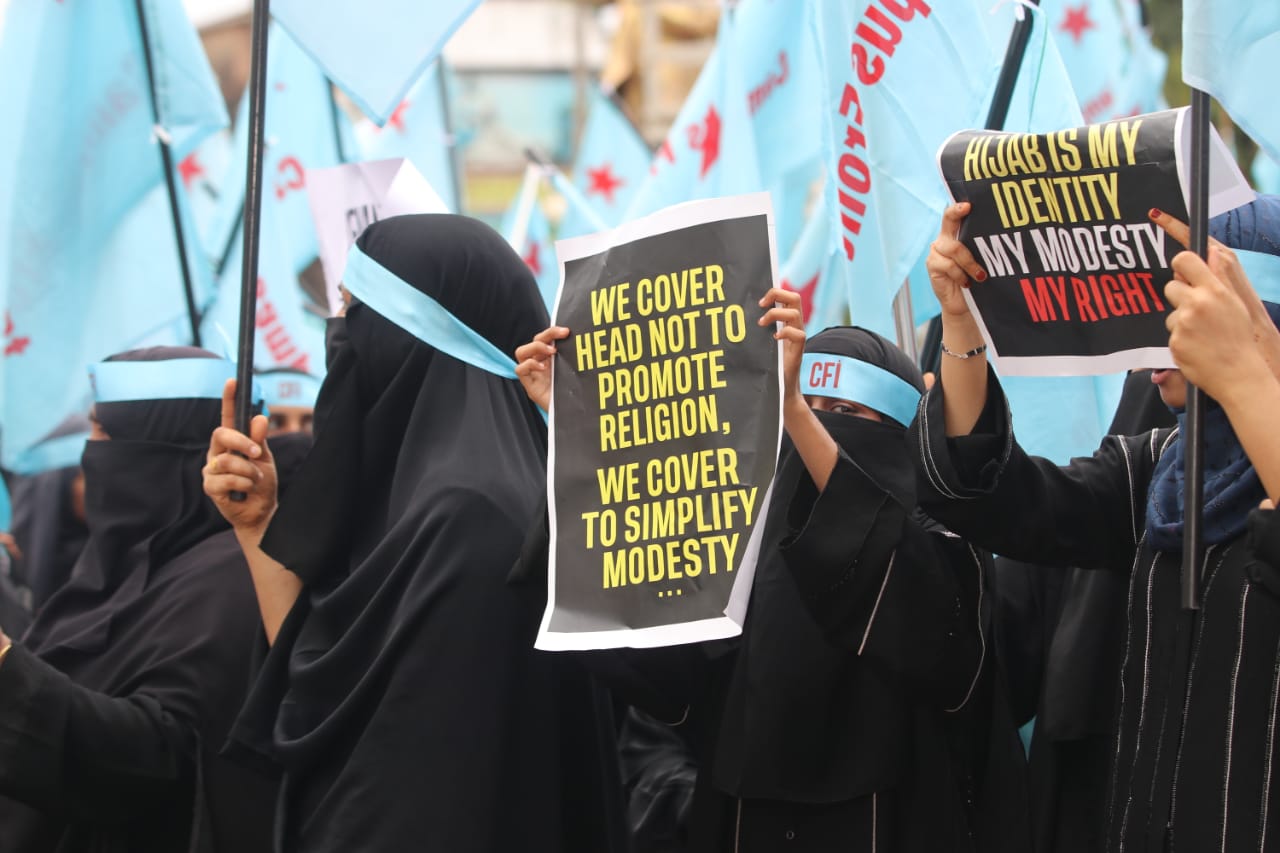 Schoolgirls participate in protests against the hijab ban in India’s southern coastal city of Mangalore