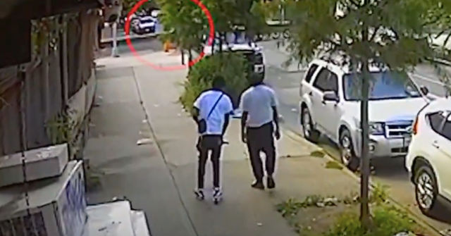 <p>The gunman shot the two boys, aged 14 and 15, just as they were walking out of a deli on East Harlem’s 128th Street on Tuesday, Screengrab </p>