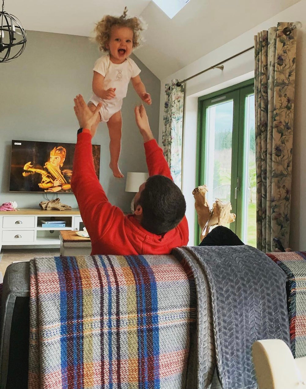 Alan playing with Sienna (Collect/PA Real Life)