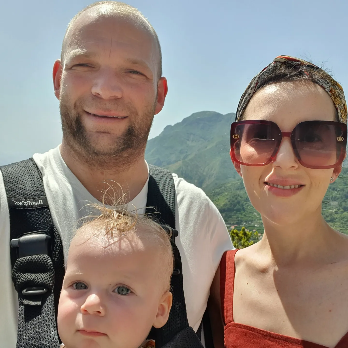 The couple and their daughter on holiday in Europe