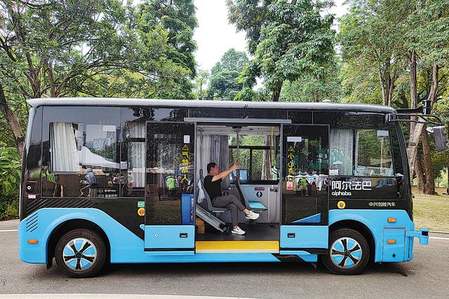 <p> An autonomous sightseeing bus carries a tourist at a scenic spot in Shenzhen, Guangdong province   </p>