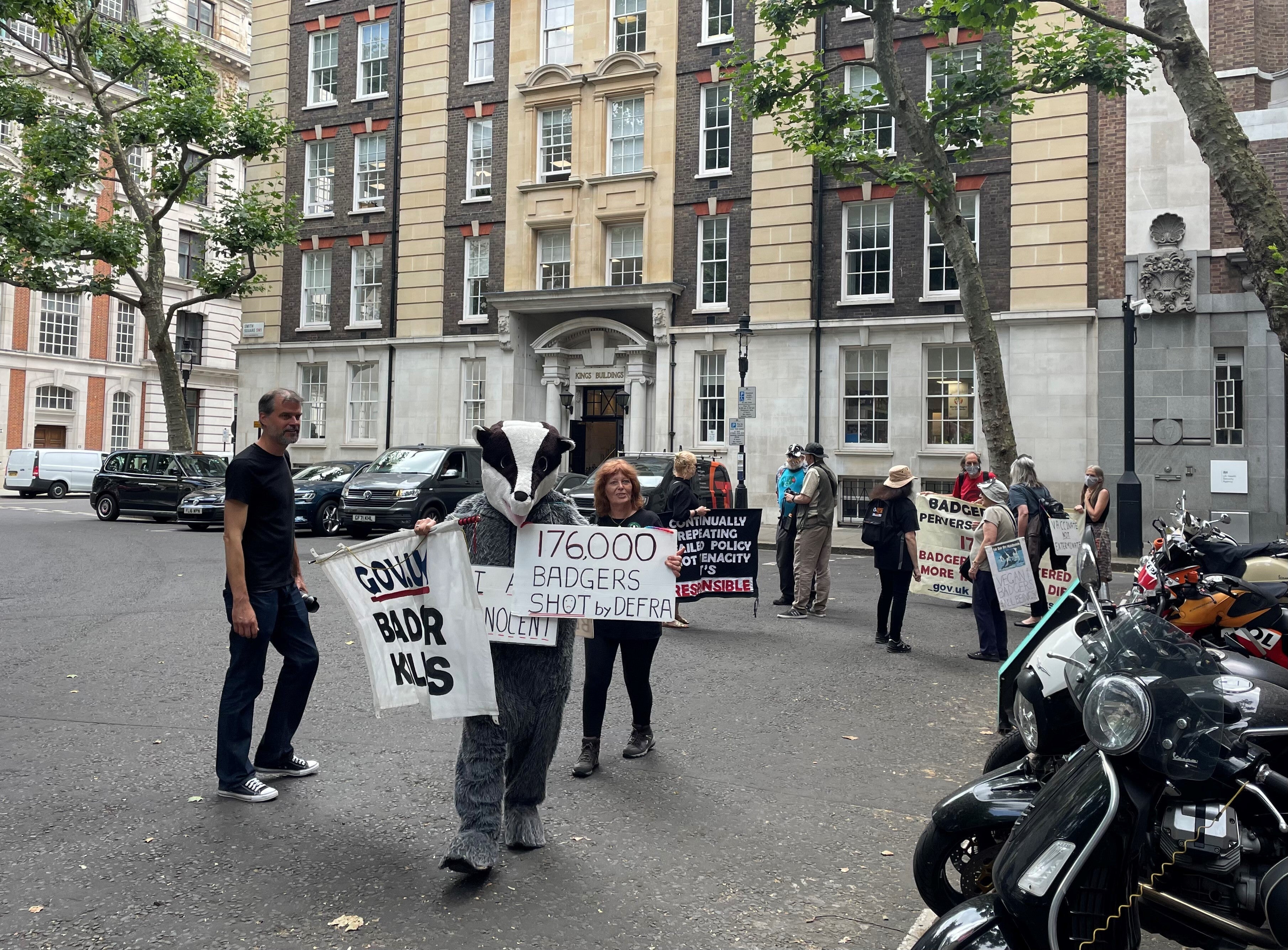 Badger cull protesters outside the Tory leadership hustings event (Sophie Wingate/PA)