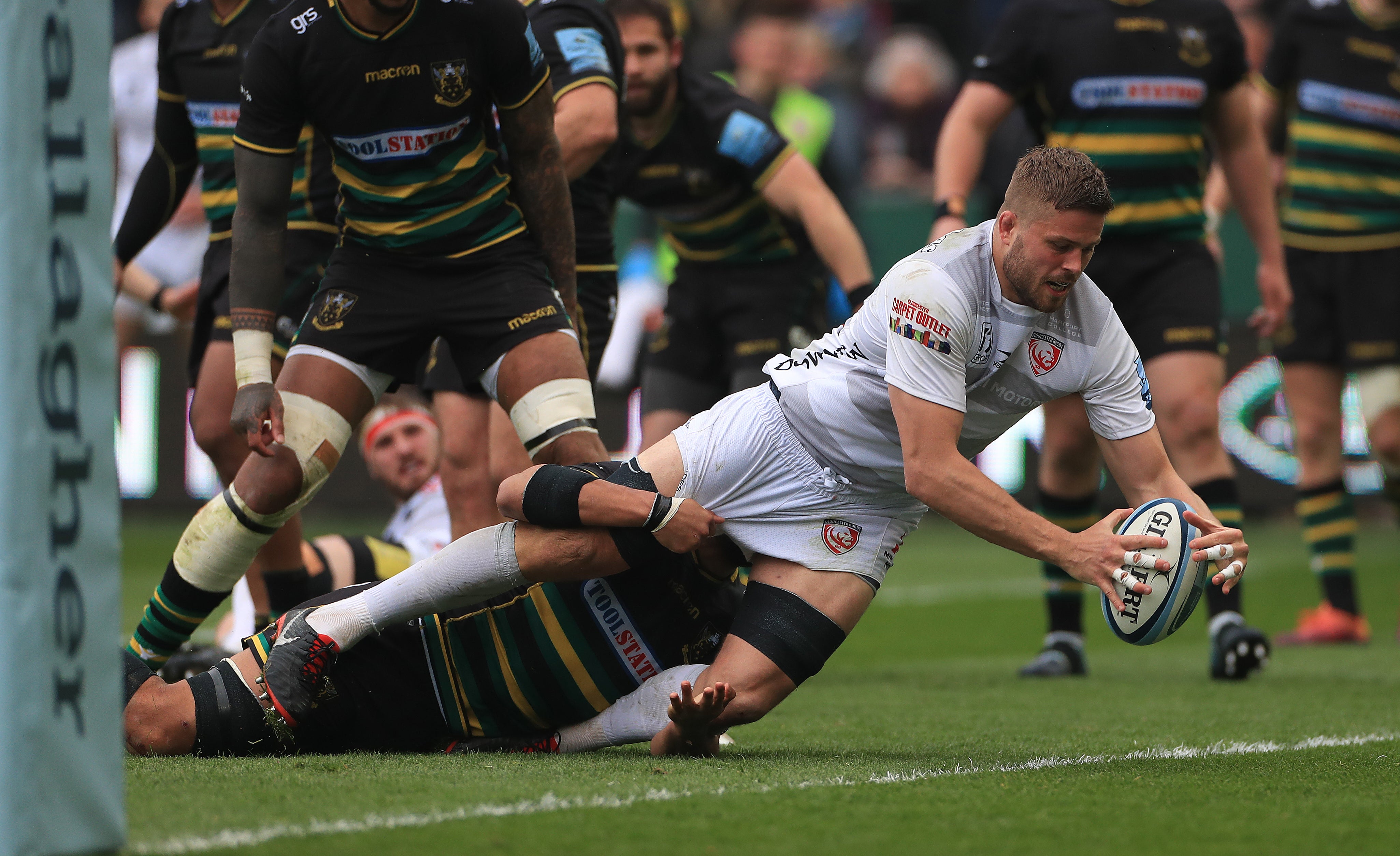 Ed Slater scores a try for Gloucester against Northampton (Mike Egerton/PA)
