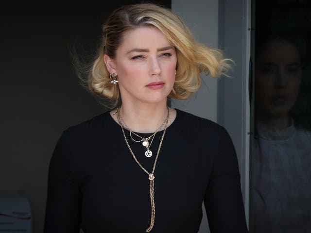 <p>Amber Heard departs the Fairfax County Courthouse on 1 June 2022 in Fairfax, Virginia</p>