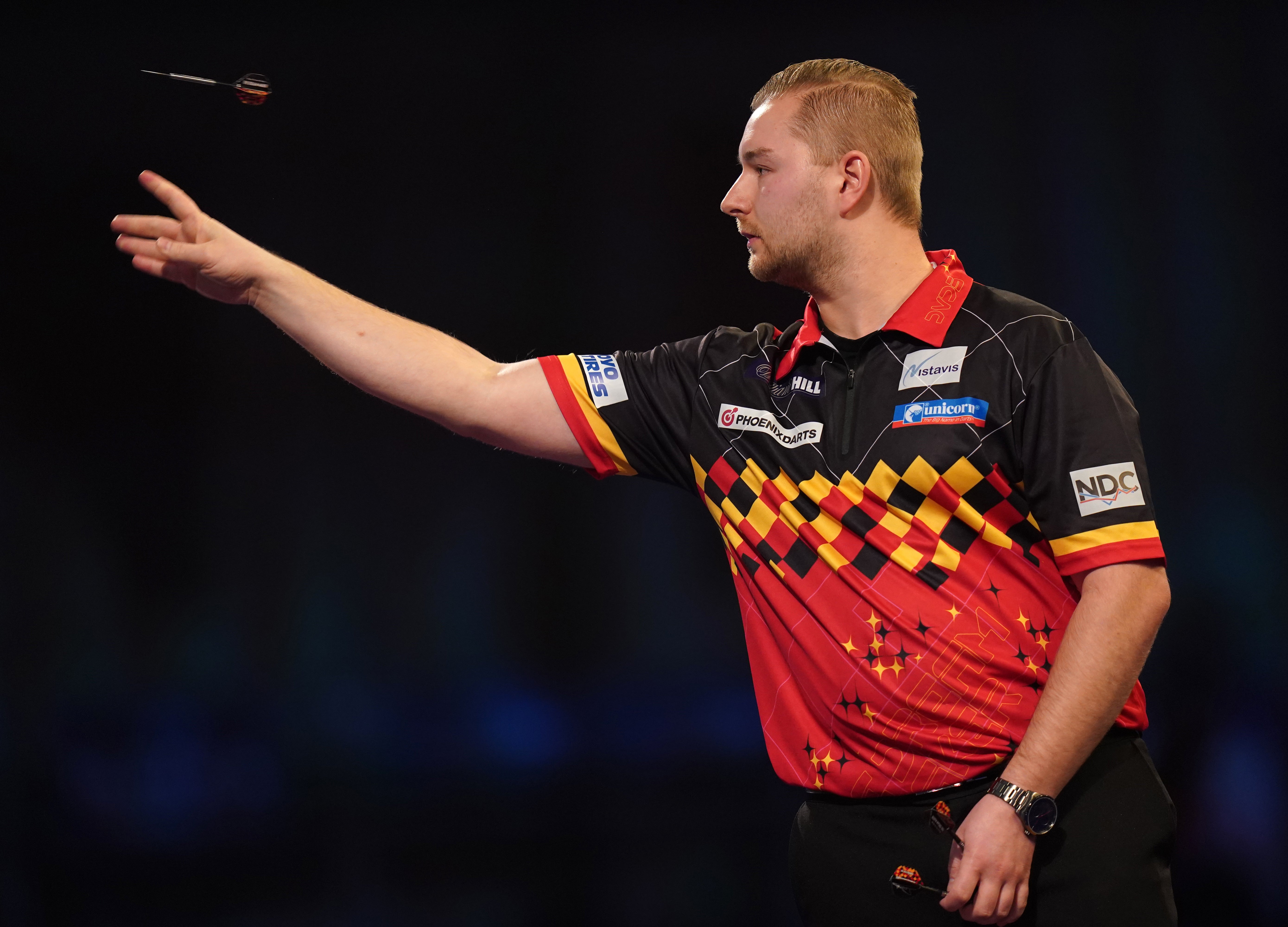 Dimitri Van Den Bergh knocked out reigning champion Peter Wright to win a classic at the World Matchplay in Blackpool (Adam Davy/PA)