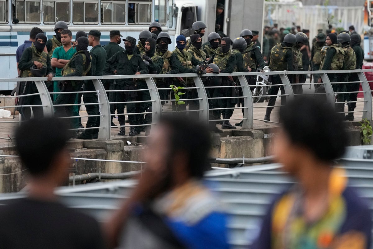Sri Lankan forces make arrests, clear main protest site