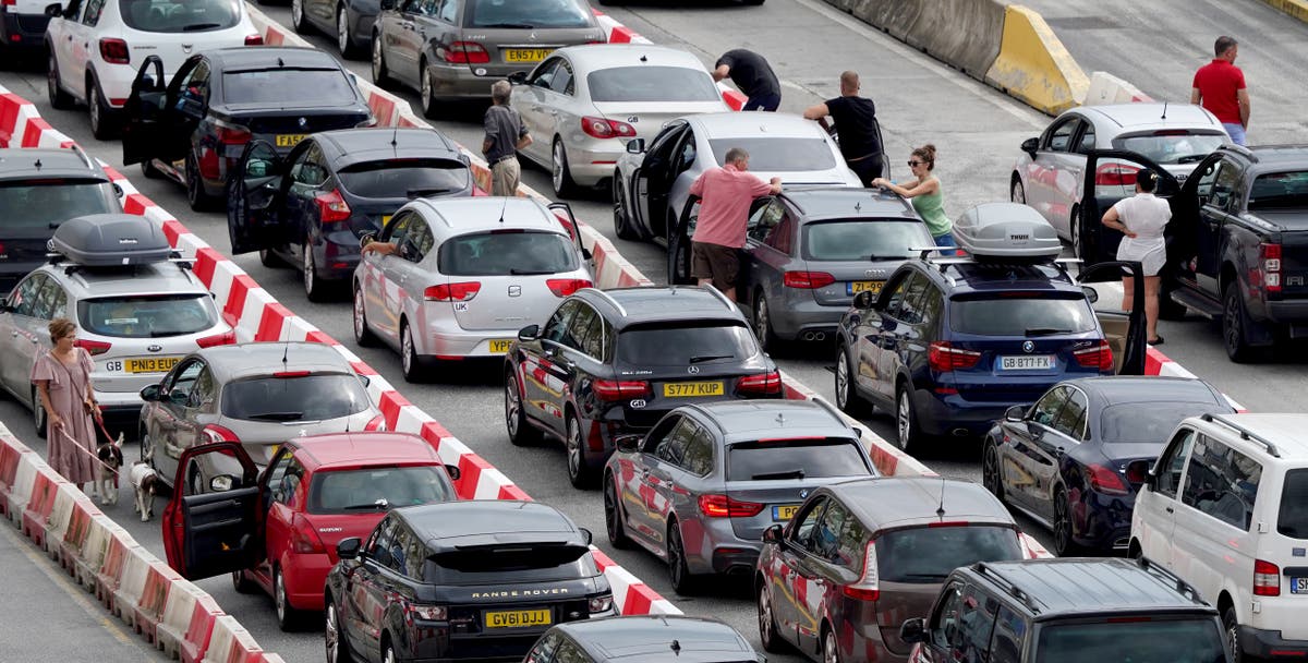 Four-hour queues at Dover as summer holiday getaway kicks off – live