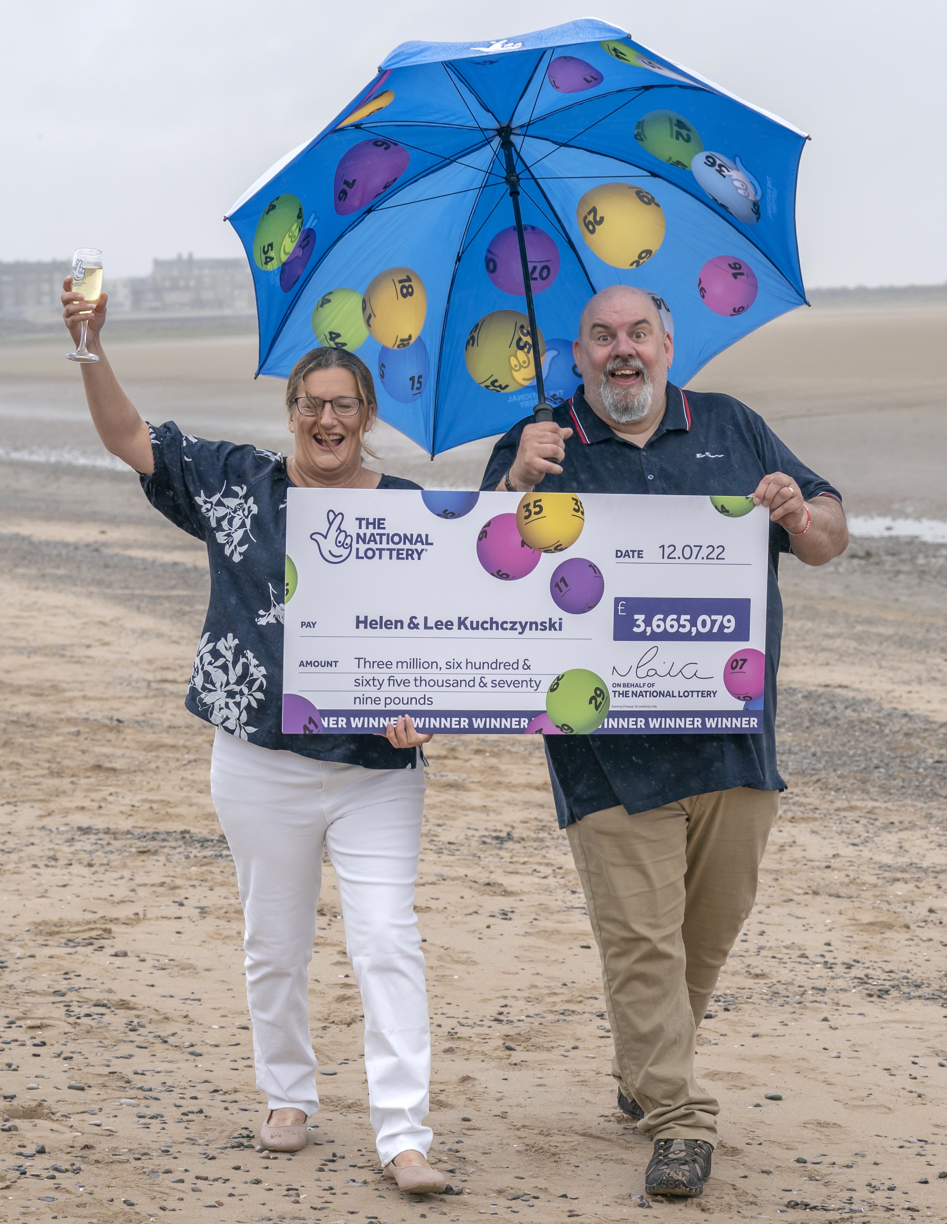 Helen and Lee Kuchczynski, from Cumbria, celebrate their ?3.6 million EuroMillions win (Danny Lawson/PA)