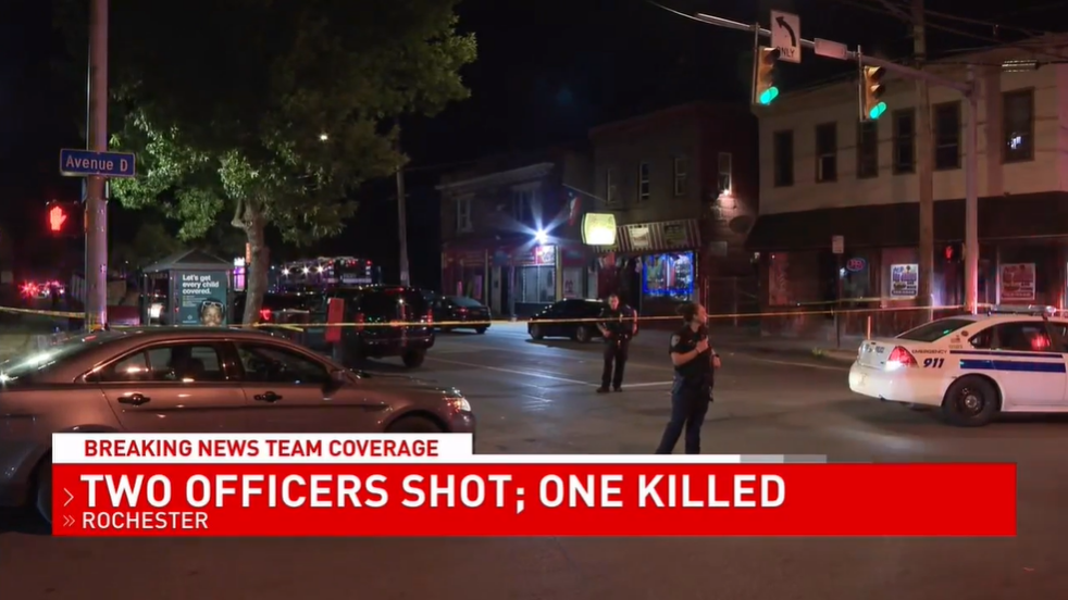 One officer was shot and killed and another wounded after a gunman opened fire on the pair of Rochester, New York police officers on Thursday night