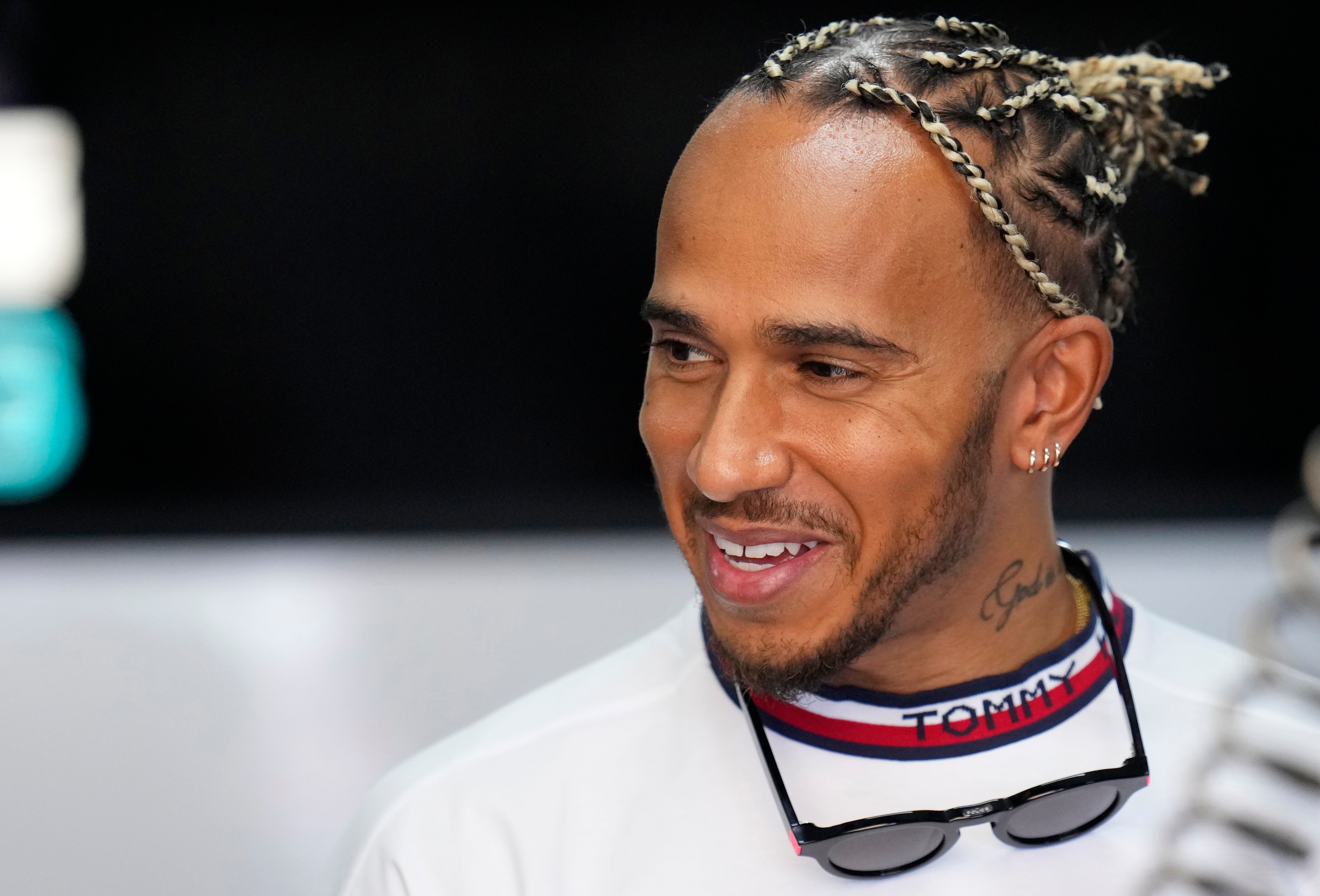 Lewis Hamilton watched the opening session from the back of the Mercedes garage (Manu Fernandez/AP)