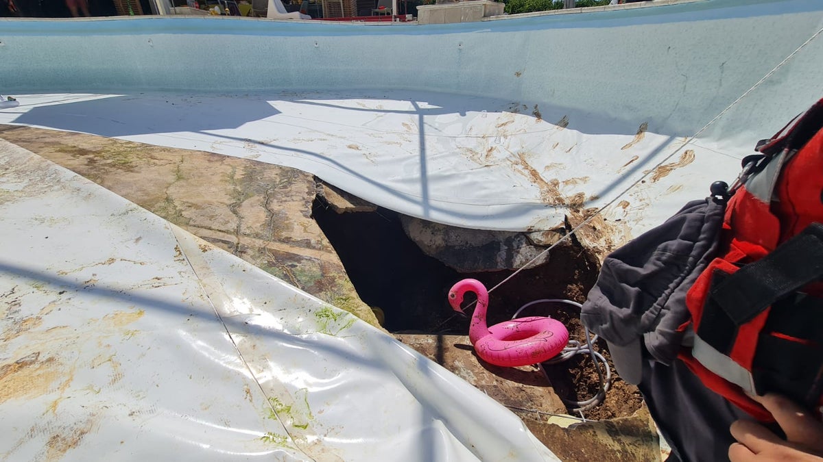 Man dies after sinkhole opens under swimming pool in Israel