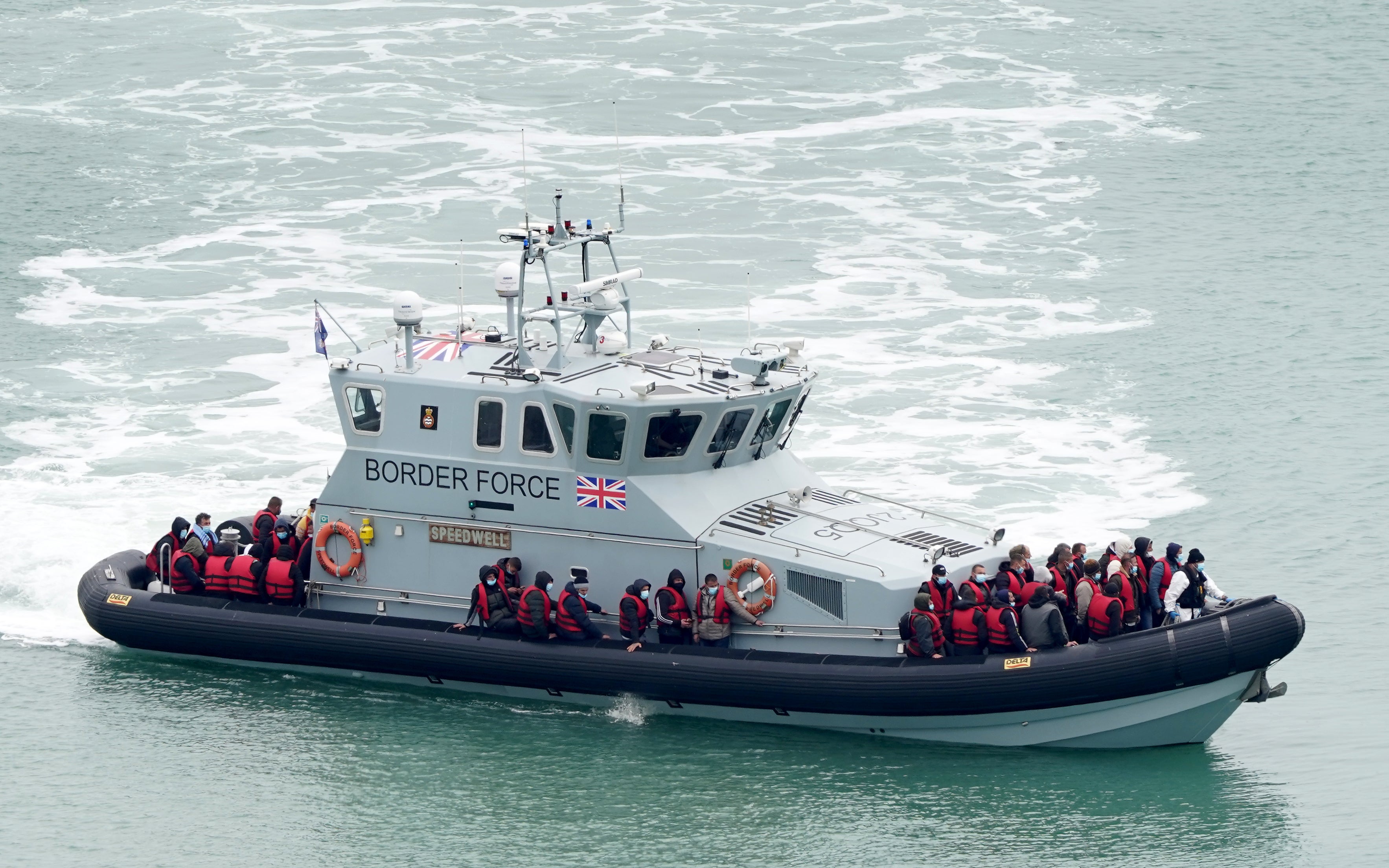 A group of people thought to be migrants are brought in to Dover, Kent. (Gareth Fuller/PA)