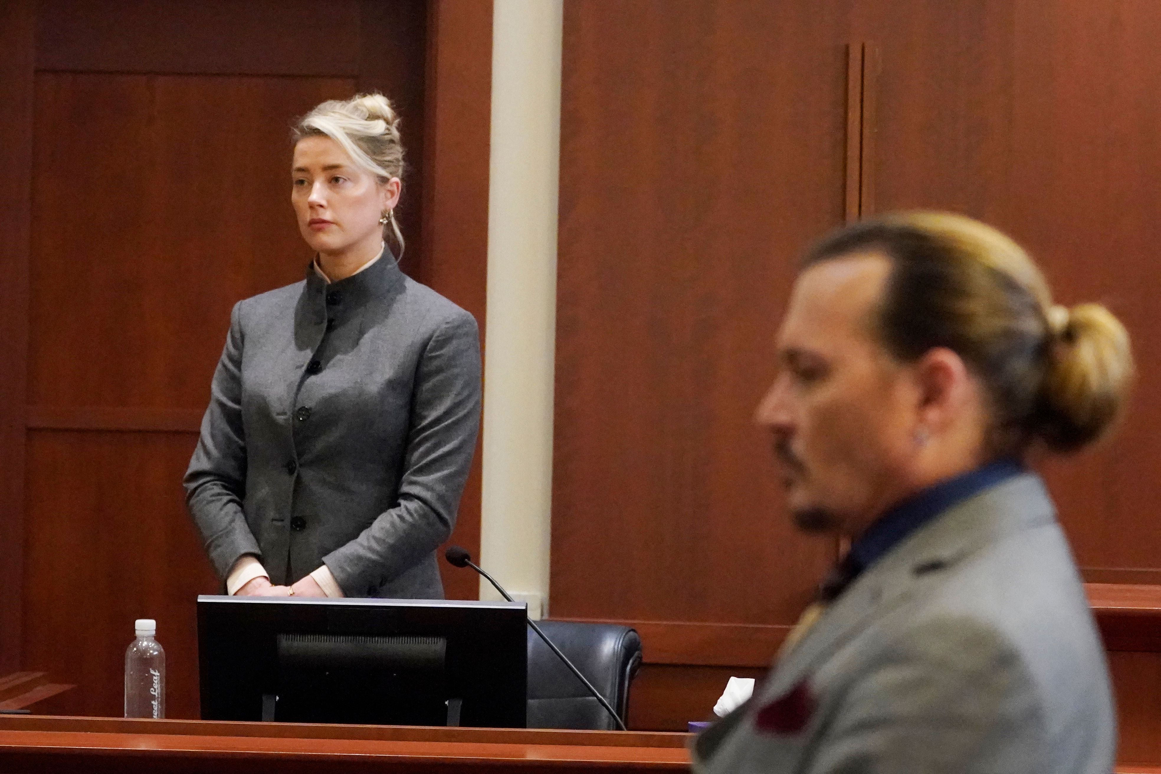 Amber Heard and Johnny Depp at Fairfax County Circuit Courthouse in Fairfax, Virginia
