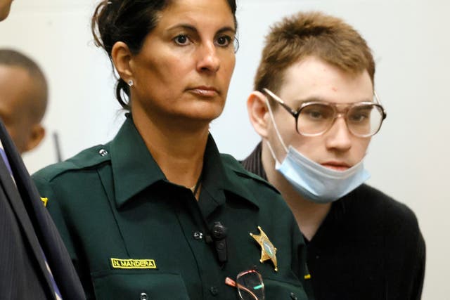 <p>Nikolas Cruz is led into the Broward County Courthouse for day five of his sentencing hearing on Friday 22 July </p>