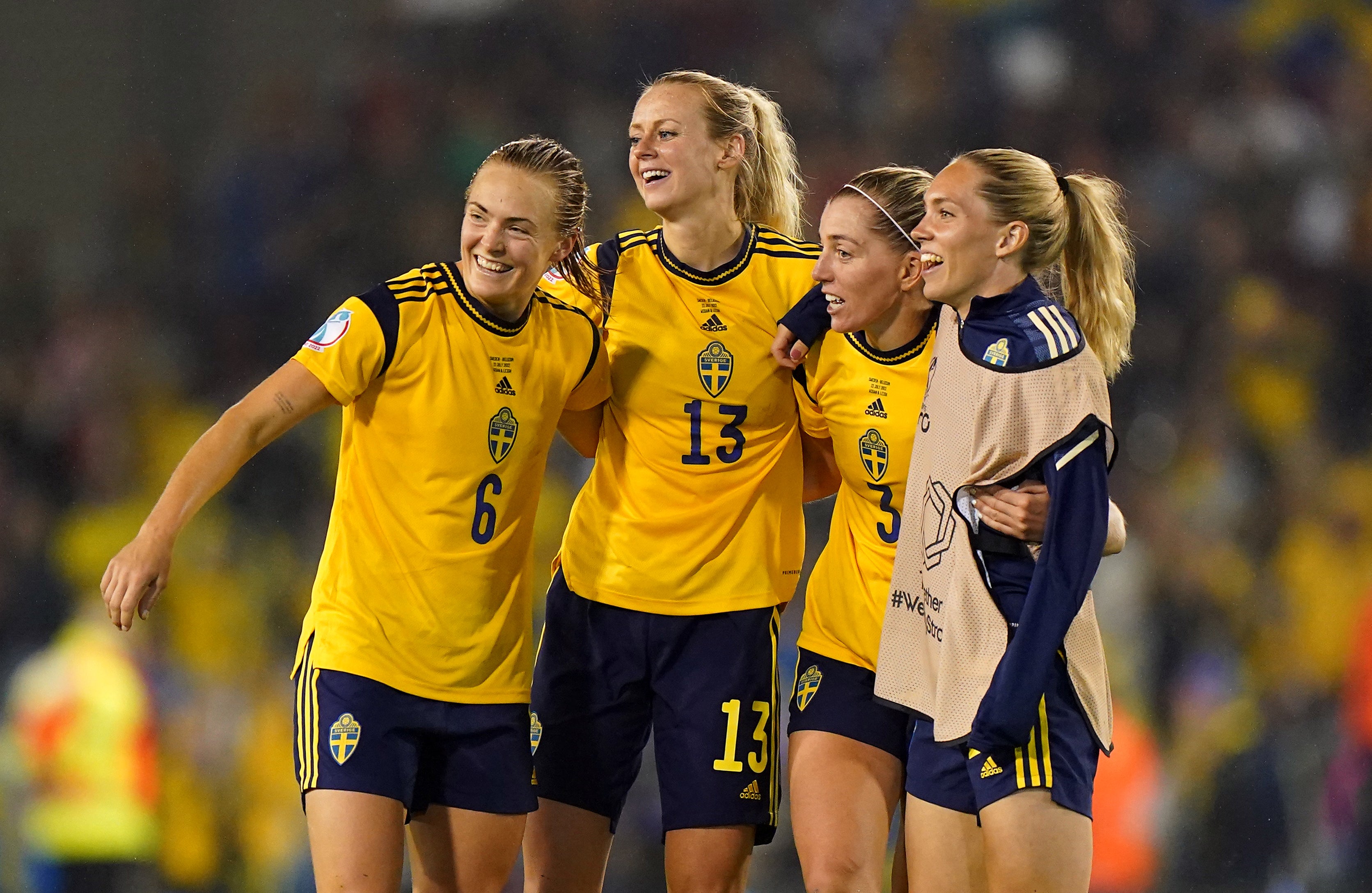 Magdalena Eriksson, left, celebrates with team-mates at full-time, including match-winner Linda Sembrant, second right (Tim Goode/PA)