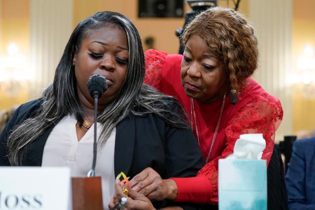 <p>Wandrea "Shaye" Moss, a former Georgia election worker, is comforted by her mother, Ruby Freeman, right, as the House select committee investigating the Jan. 6 attack on the U.S. Capitol holds a hearing at the Capitol in Washington, June 21, 2022.</p>