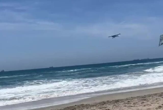 <p>Beachgoers panic as plane crashes into ocean in Huntington Beach</p>