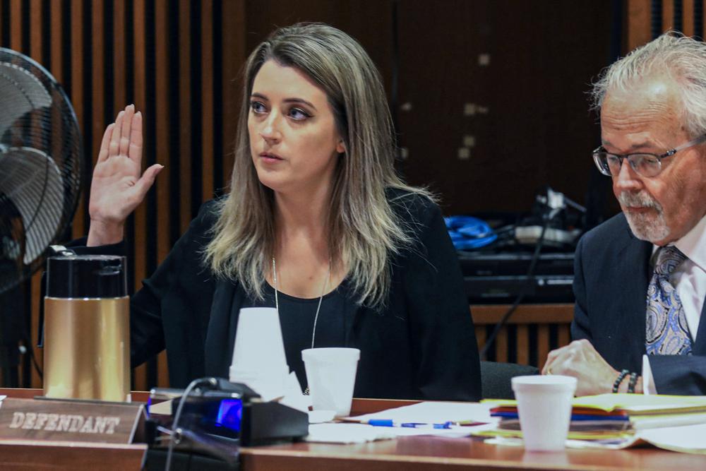 File photo: Kate McClure, 29, charged with theft by deception in the $400,00 GoFundMe scam, with her lawyer Jim Gerrow Jr, in State Superior Court, Burlington County Courthouse in 2019
