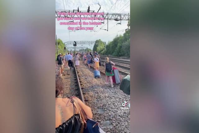 <p>Train passengers forced to walk down tracks as heatwave causes evacuation</p>