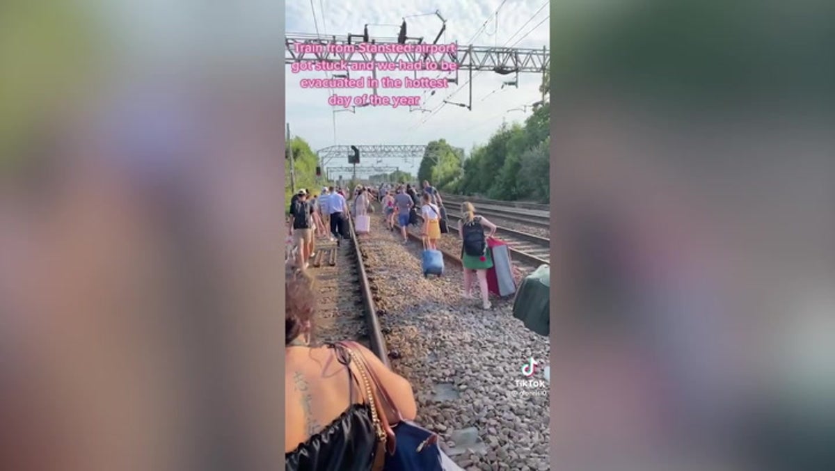 Train passengers forced to walk down tracks as heatwave prompts evacuation