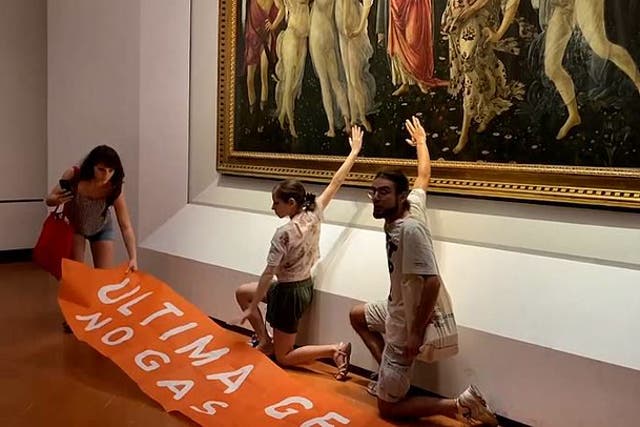 <p>Italian climate activists glue their hands to Botticelli painting</p>