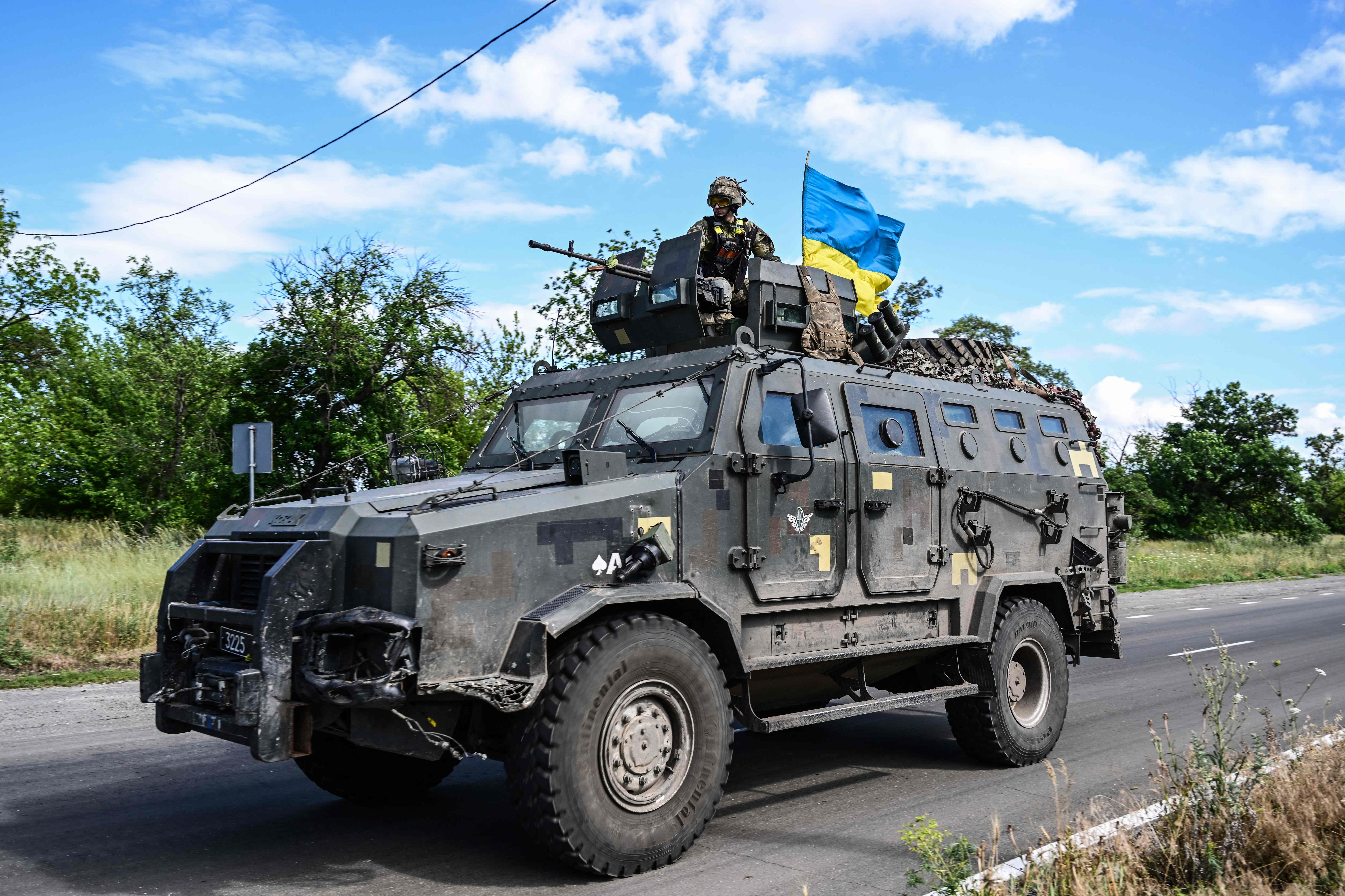 A Ukrainian serviceman stands in an infantry mobility vehicle in Kramatorsk, eastern Ukraine