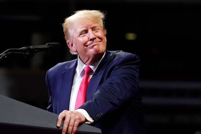 <p>Former President Donald Trump pauses while speaking at a Save America rally 22 July 2022. Some in the crowd booed his endorsement of Eli Crane</p>